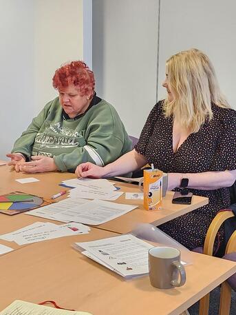 Perosn with learning disability testing the new game